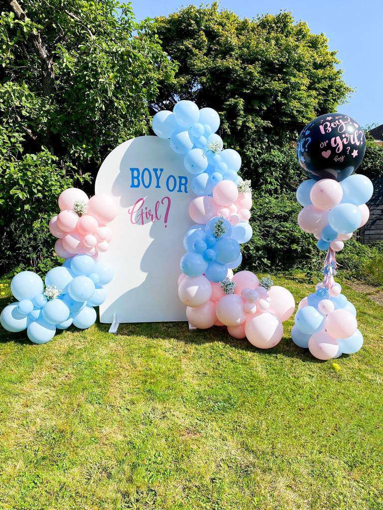 Natural latex balloon styling in soft green tones